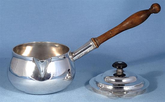 A George III Irish silver brandy pan and cover, by James Le Bass, length 310mm, gross weight 18.8oz/585grms.